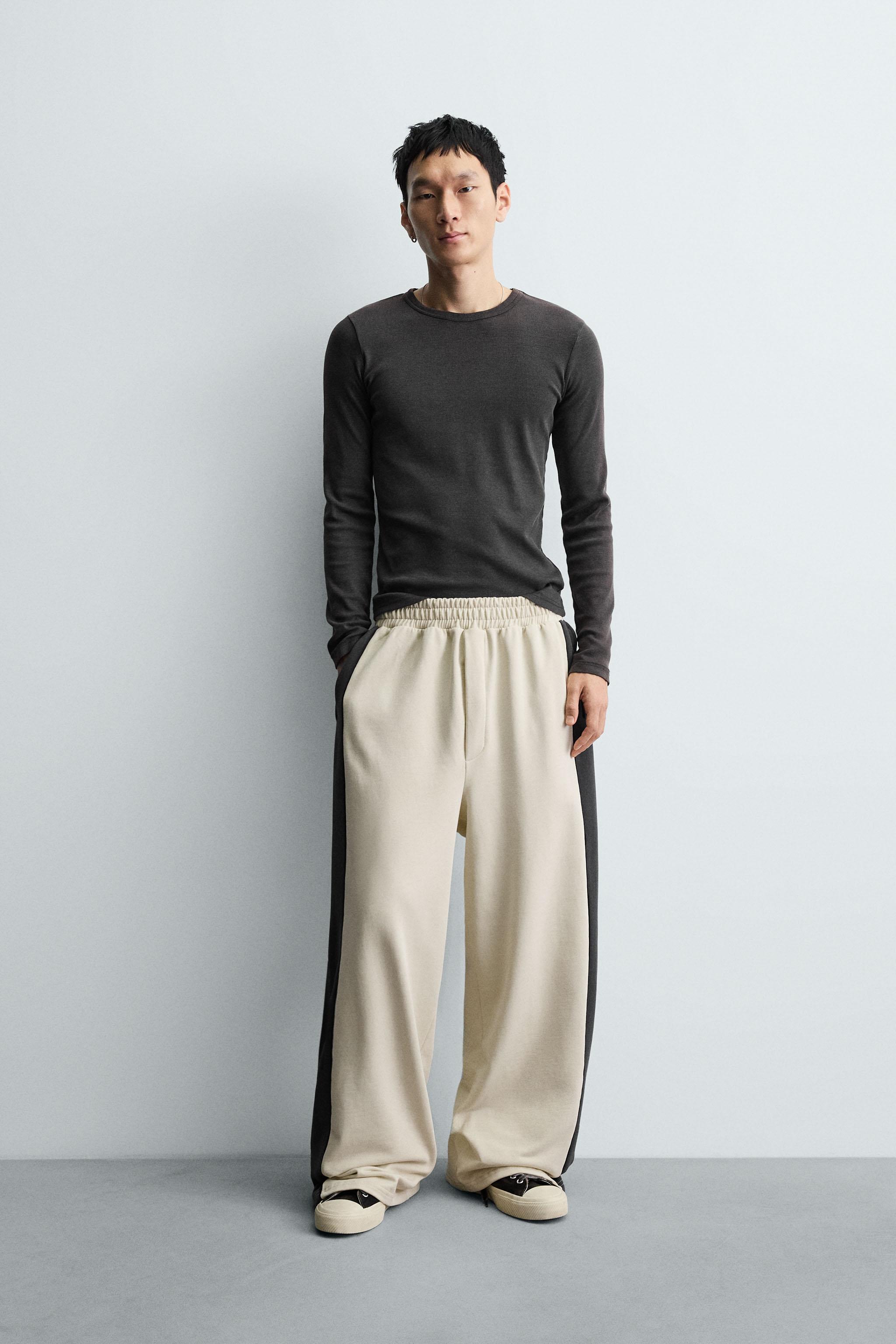 WIDE FIT JOGGER PANTS WITH STRIPES